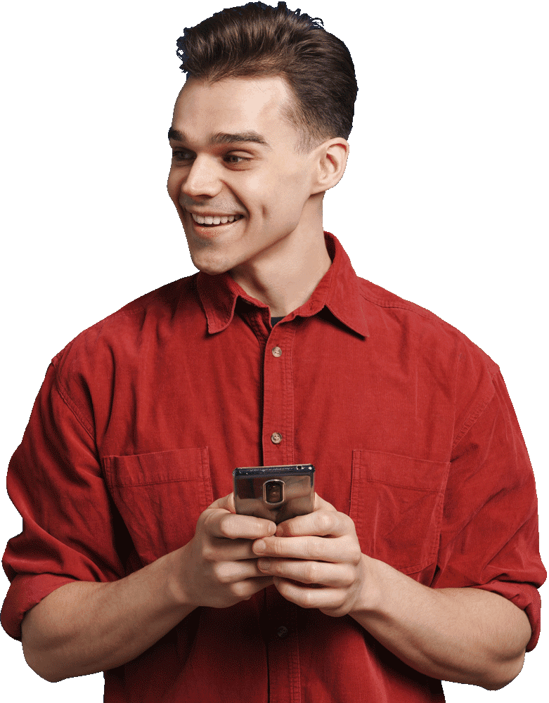 a young boy is smiling and hold a mobile phone on its hands